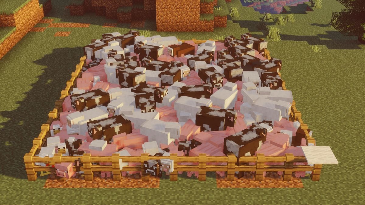 Lots of Pigs, Cows, Sheep, and Chickens in an enclosure in Minecraft.