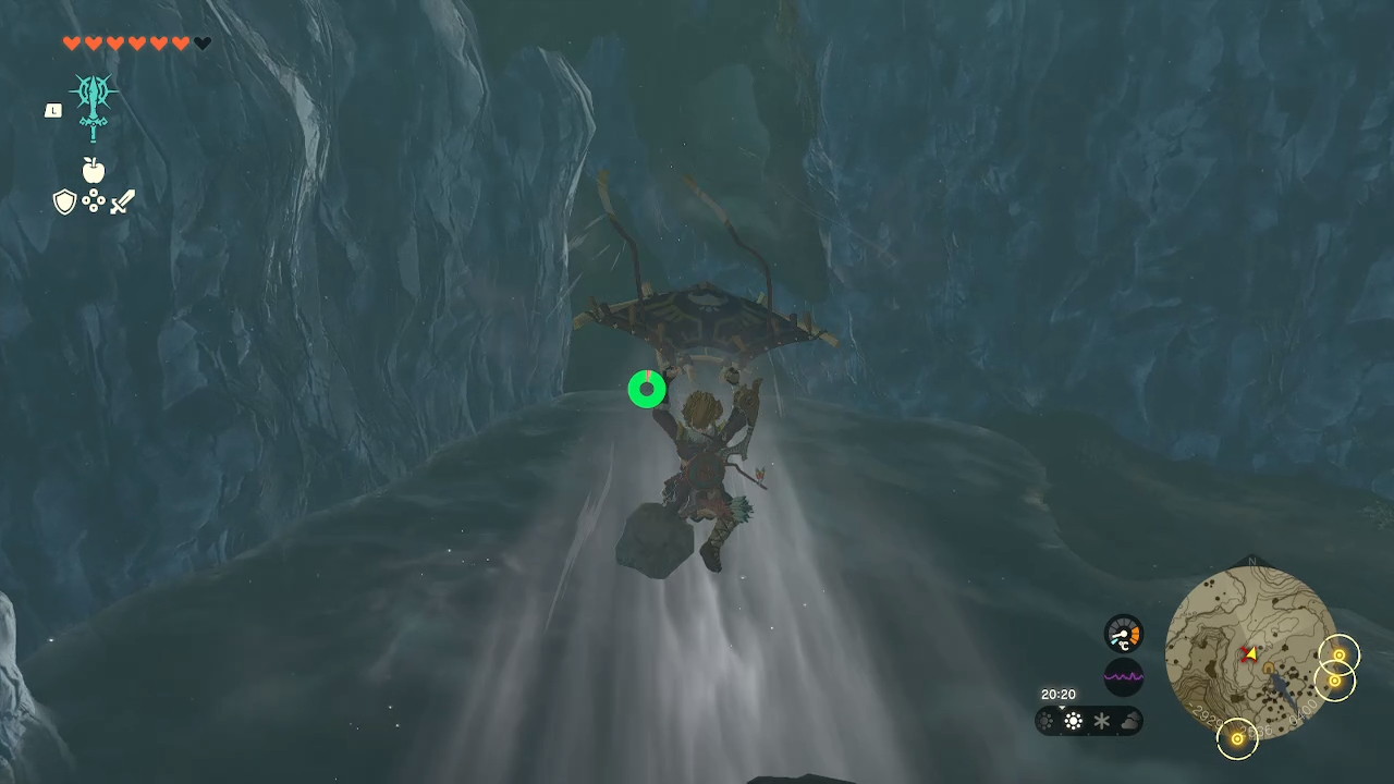 Link gliding over a pool in a cave.