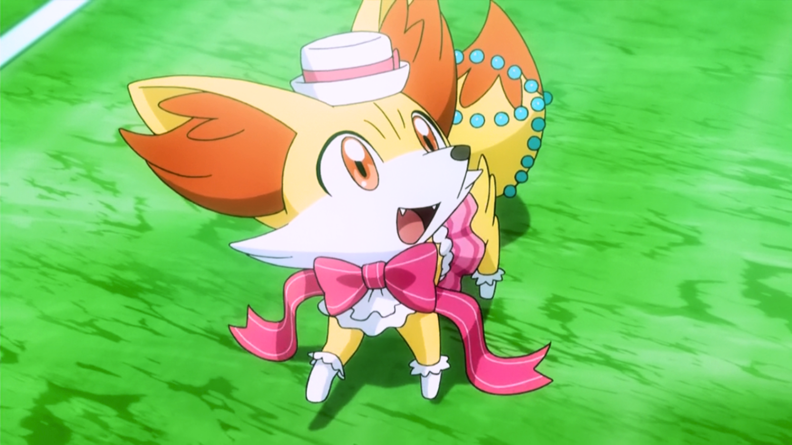 Fennekin smiling in a pink costume in the Pokémon anime.
