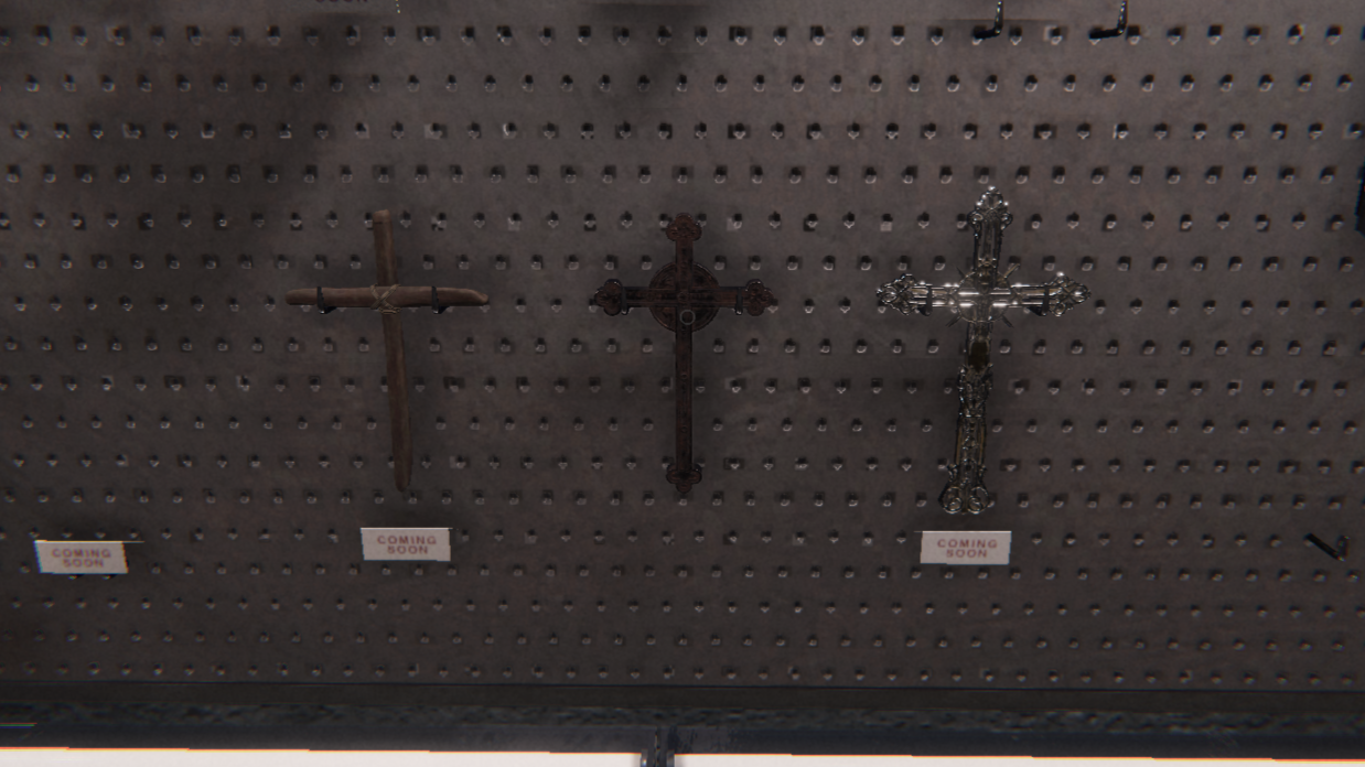 The three types of Crucifix hanging on a wall in Phasmophobia.