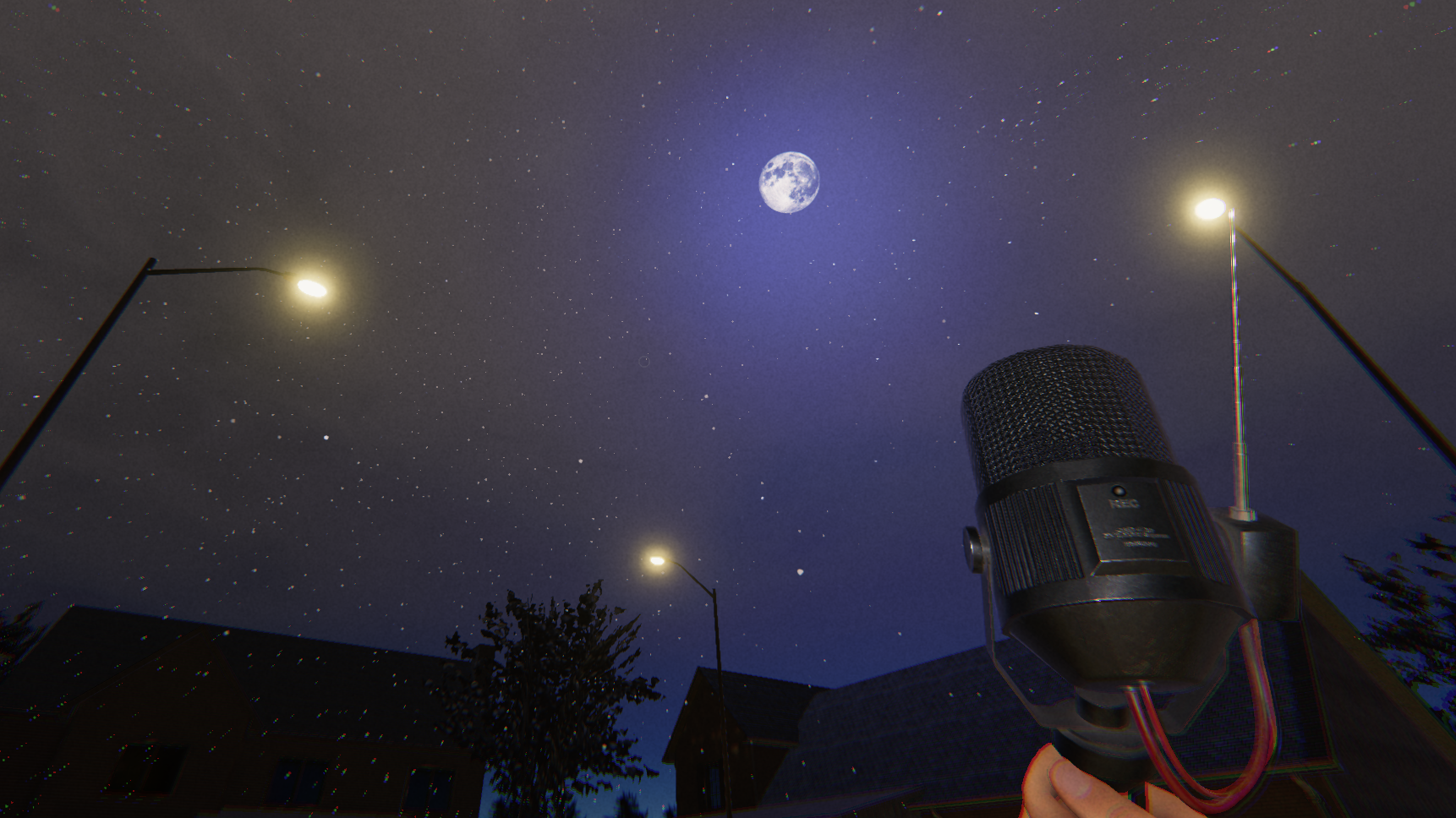 The player holding a Sound Sensor while outside in snow in front of a full moon.