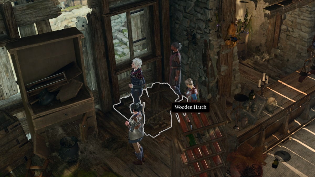 The player character in Baldur's Gate 3 stands in a group with Astarion, Wyll, and Shadowheart next to a wooden hatch that's highlighted.