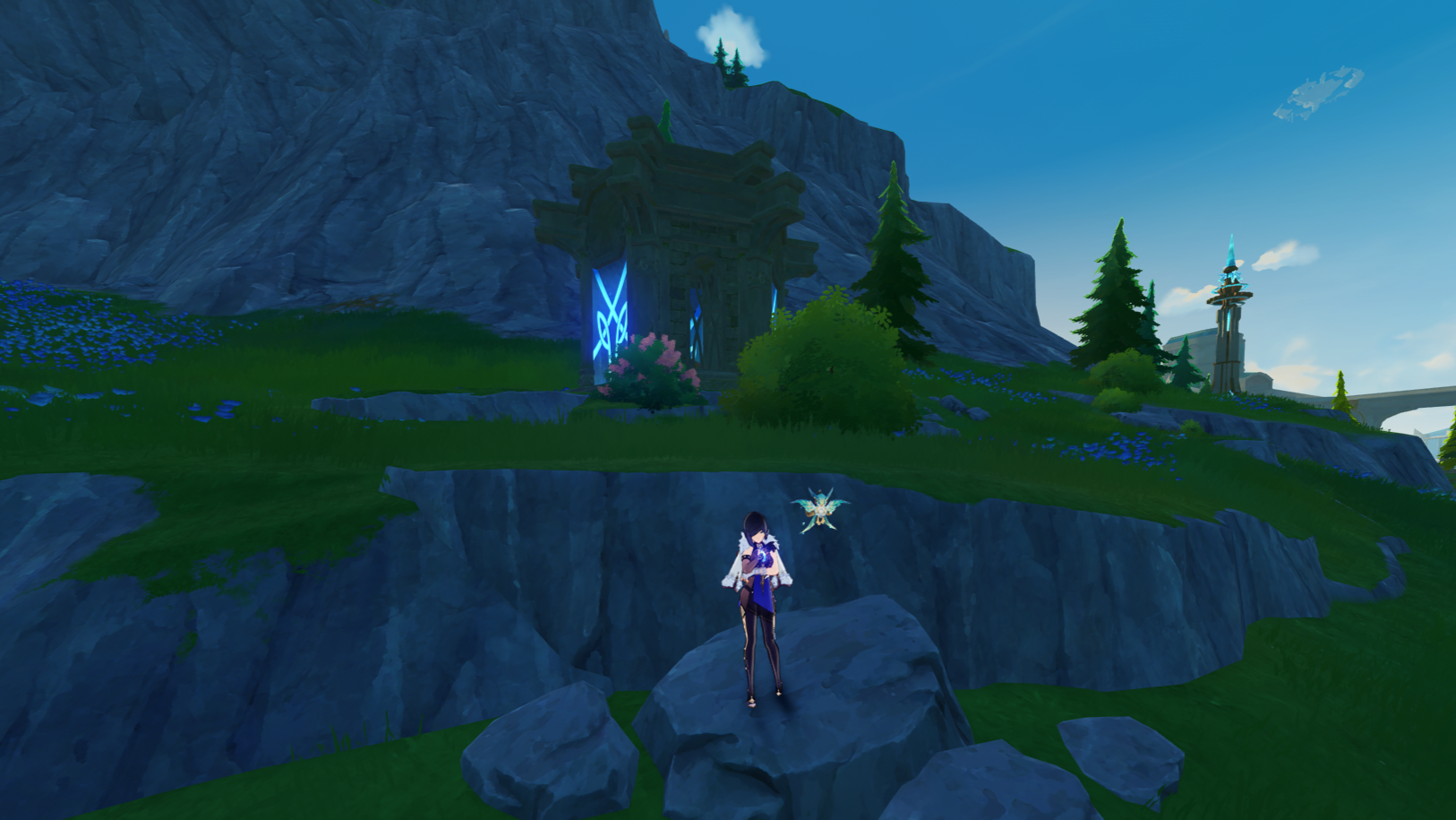 Yelan standing on a rock with an unopened Shrine of Depths behind her on a hill.
