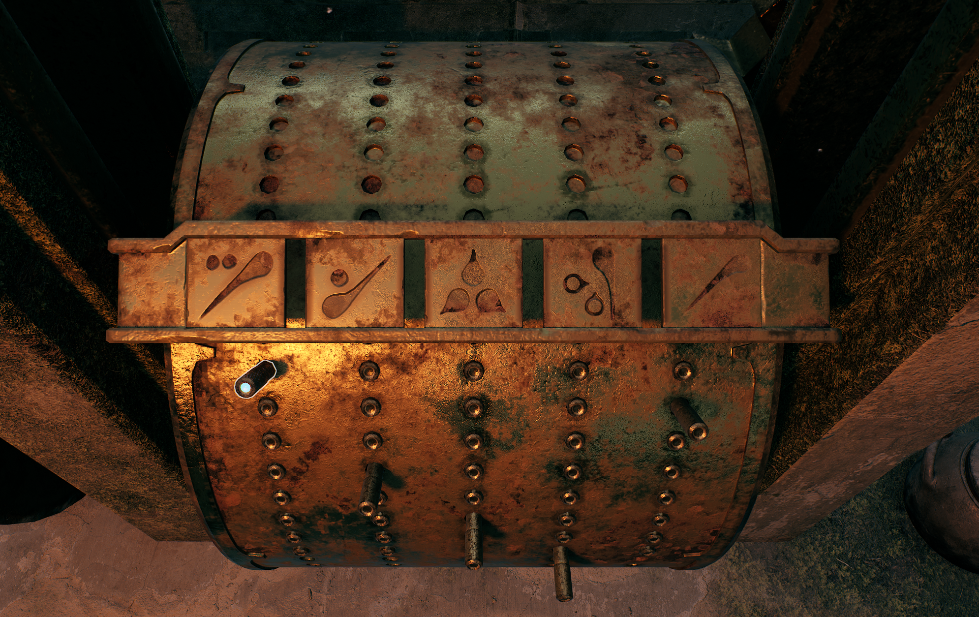 A brass metal box with slots and pegs that correspond to symbols in Remnant 2.