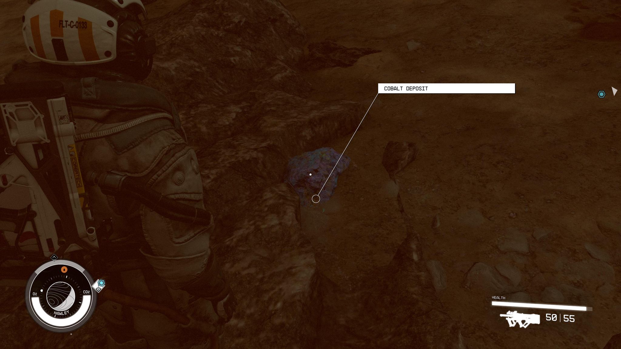 Starfield player encountering Cobalt in the wild, a purplish stone sitting on a desert floor.