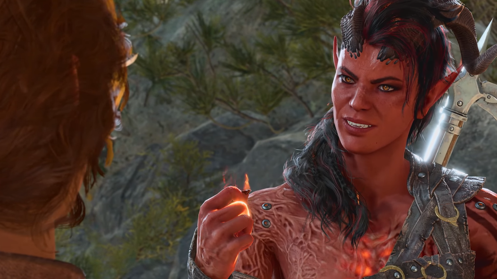 The Barbarian Karlach pumps her fist while talking to the player character in Baldur's Gate 3.