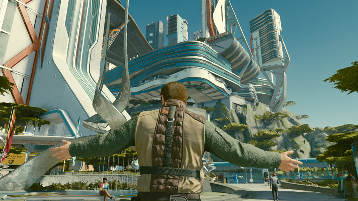 A character raises their arms as they stand in a courtyard of a futuristic city in Starfield.