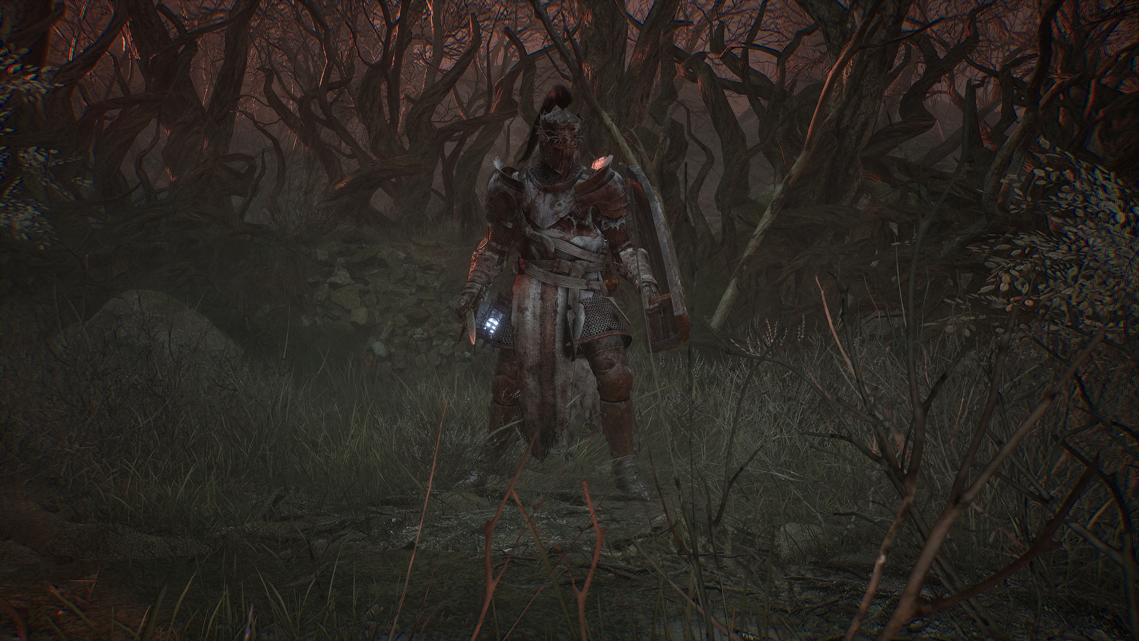 A character in Lords of the Fallen standing in a barren field.