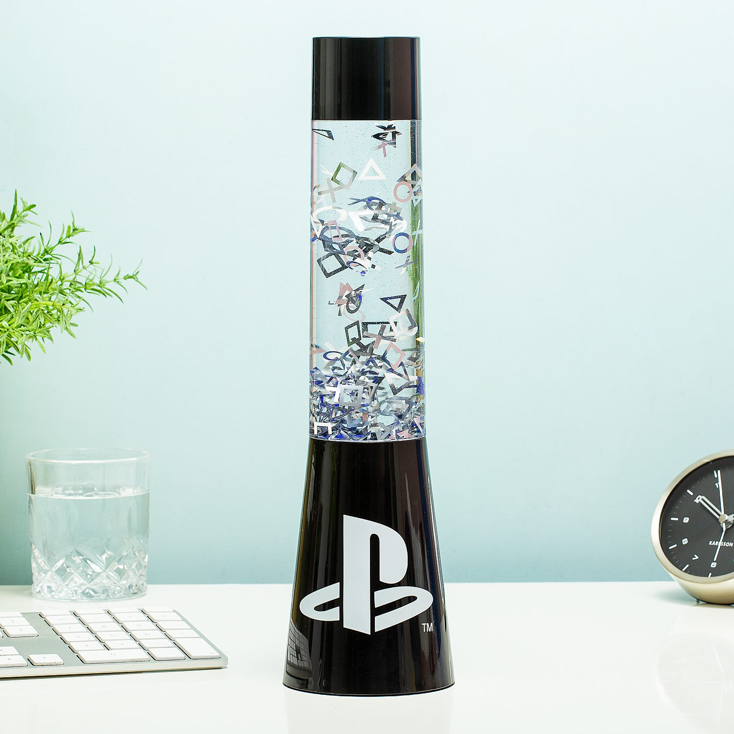 A promotional image of the PlayStation Glitter Flow lamp from Paladone.