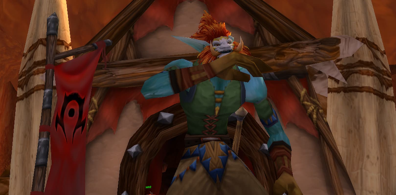 Shaman Troll standing in front of Den