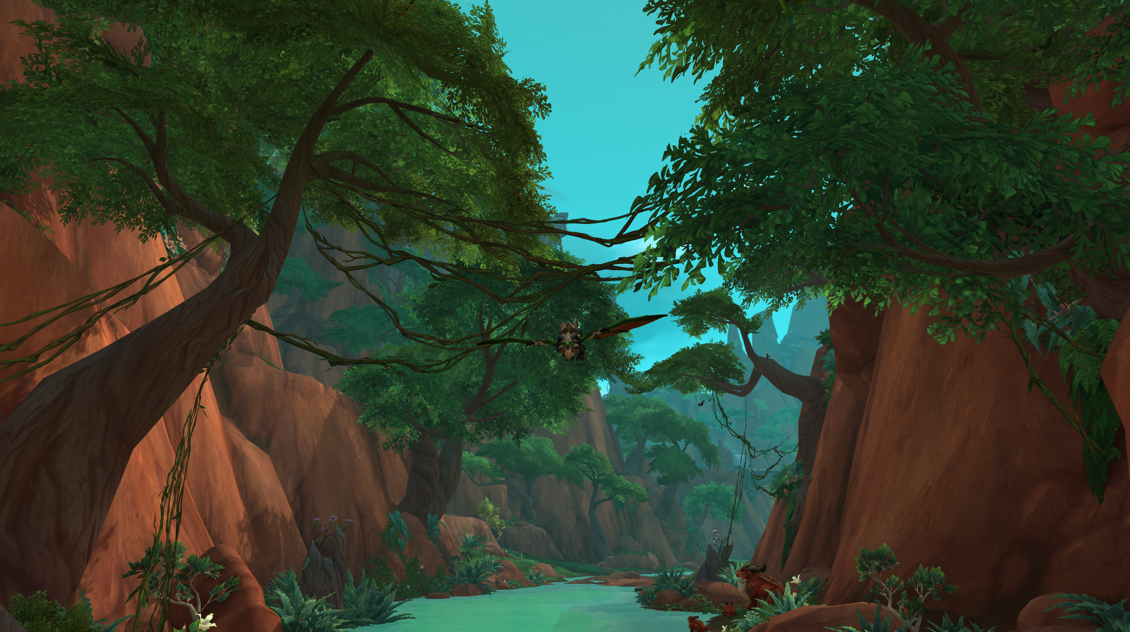 A Cliffside Wylderdrake with green scales flying through the rivers of the Waking Shores in WoW Dragonflight