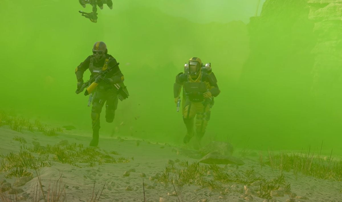 Two Helldivers running through toxic gas in Chemical Agents trailer