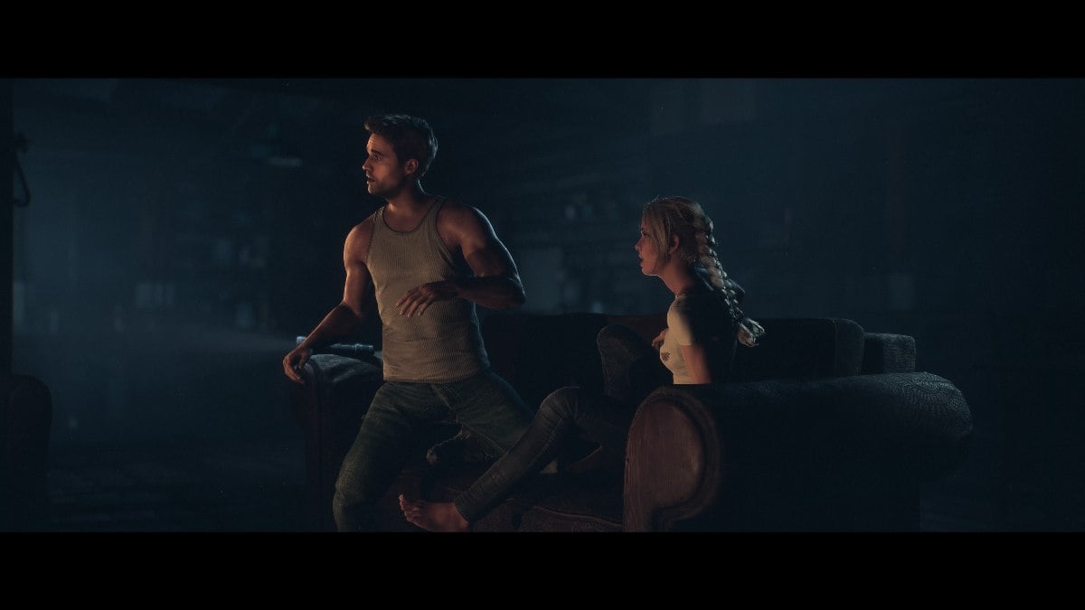 Mike standing up from the couch that Jess sits on, both looking off to the left after hearing glass smash