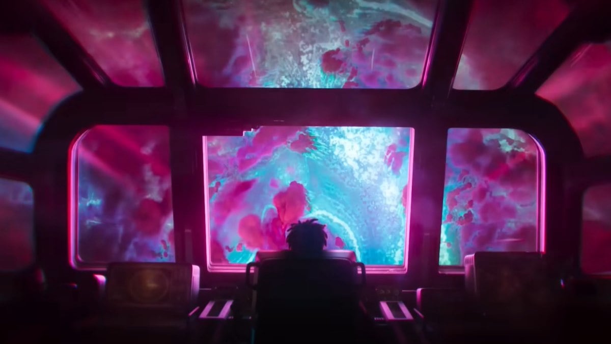 A wide shot looking at the back of the Concord captain looking at the Tempest as their aircraft travels through it