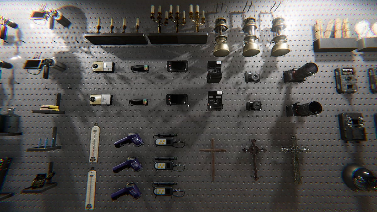 A bunch of ghost hunting gear mounted on a wall in Phasmophobia.