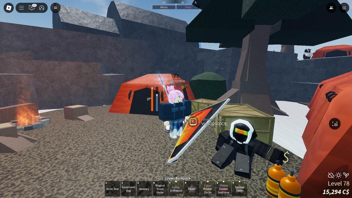 An orange and yellow glider on the ground by a player in Roblox Fisch.