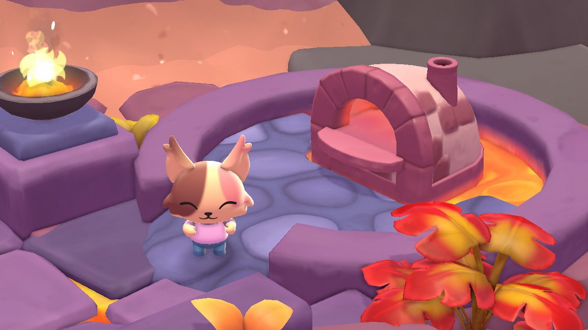 A cat stands next to a brick oven on a stone circle.