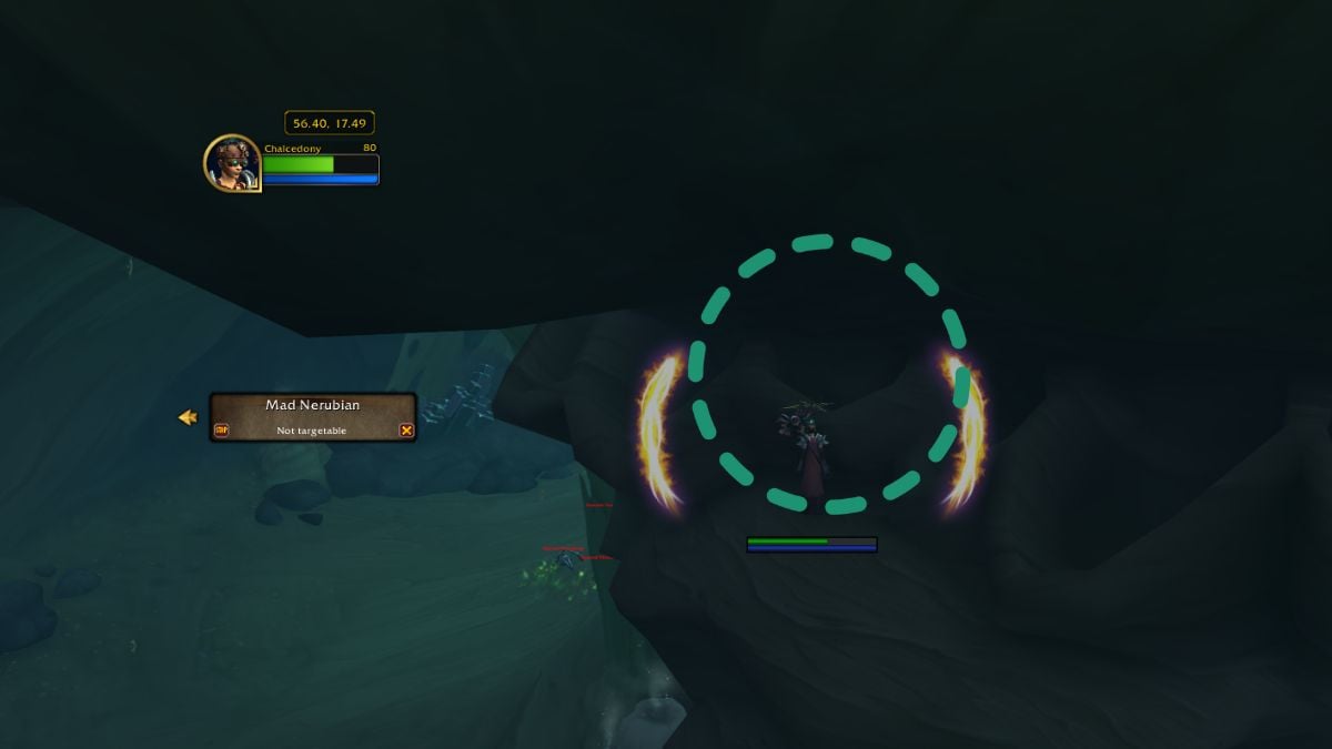 Player jumping into wall to find the secret cave in World of Warcraf with blue circle.