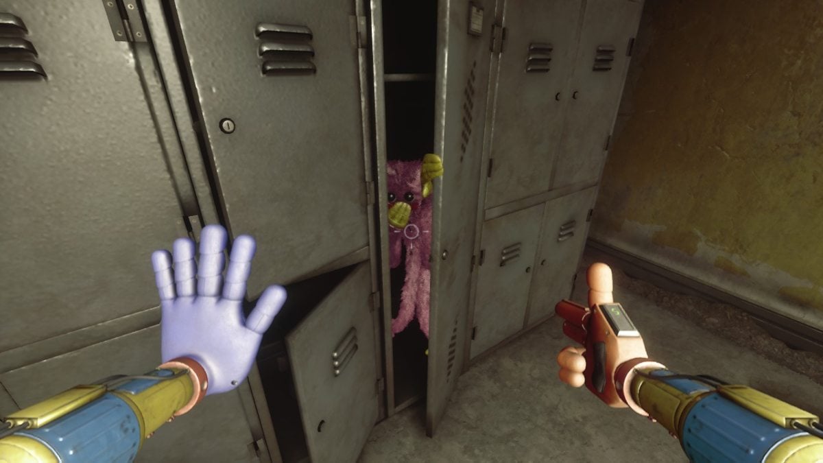 Looking at a Mini Kissy Missy hiding inside a Safe Haven locker, covering her mouth