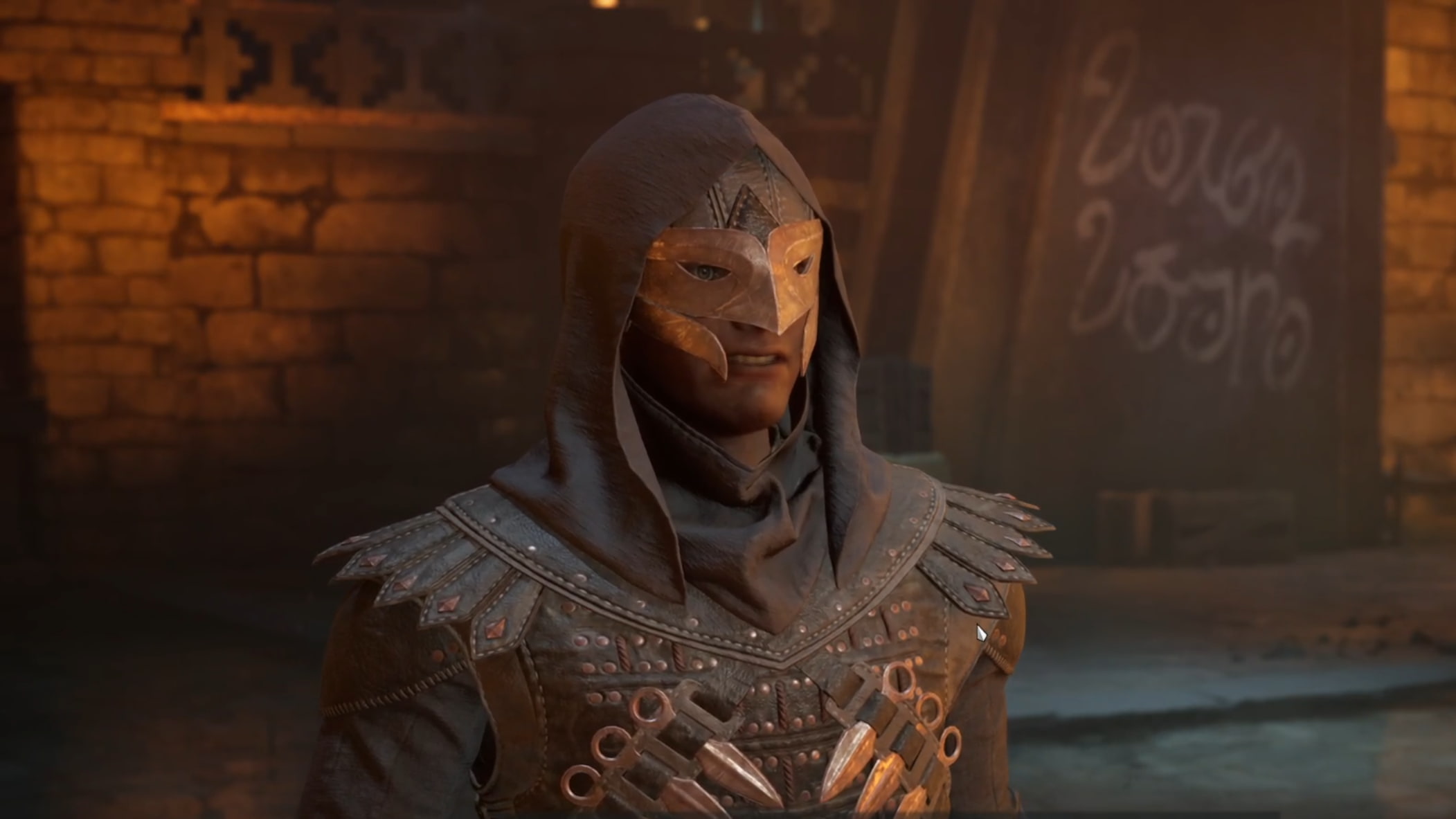 A man in a hood and a bird mask with daggers attached to his chest armor speaks.