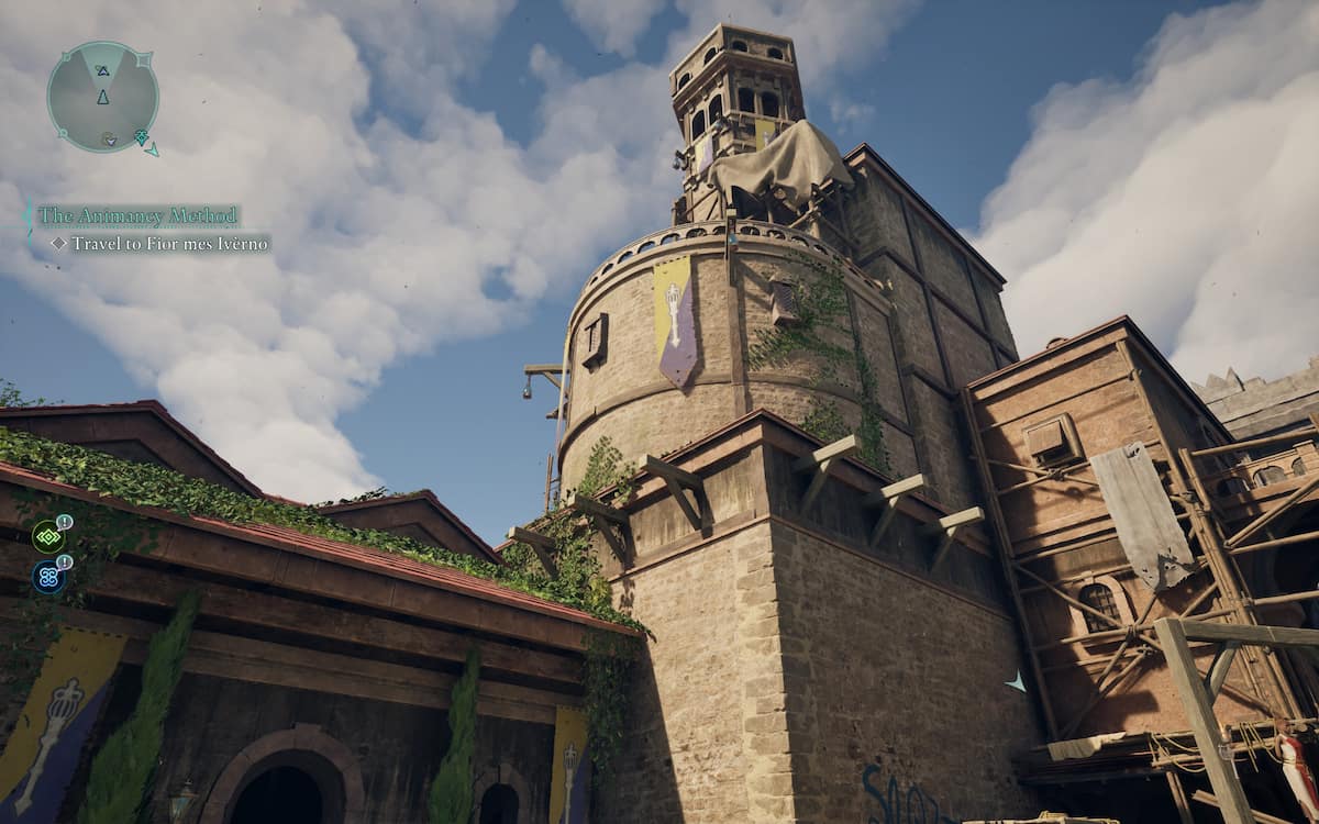 Player character on the ground looking up at a tall building with ornamentations and scaffolding on the sides