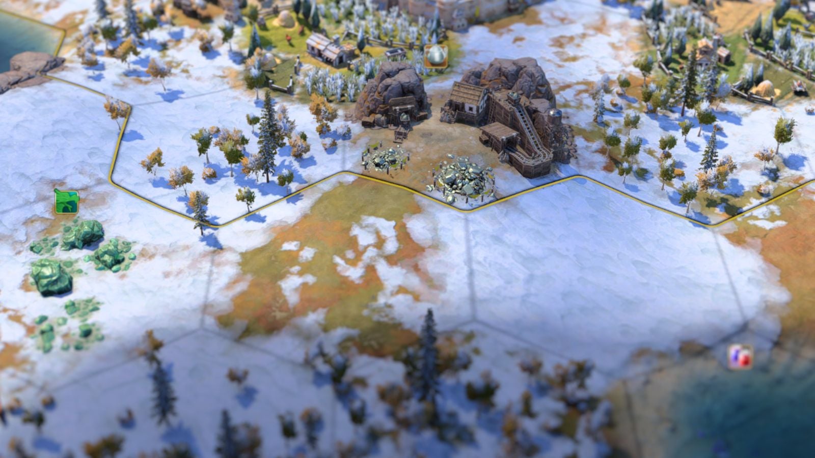 Civilization 7 screenshot of a snowy section of a map with small settlements nearby.