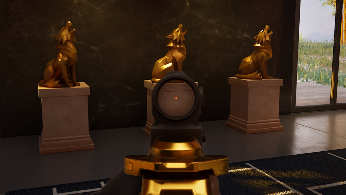 three golden wolf statues