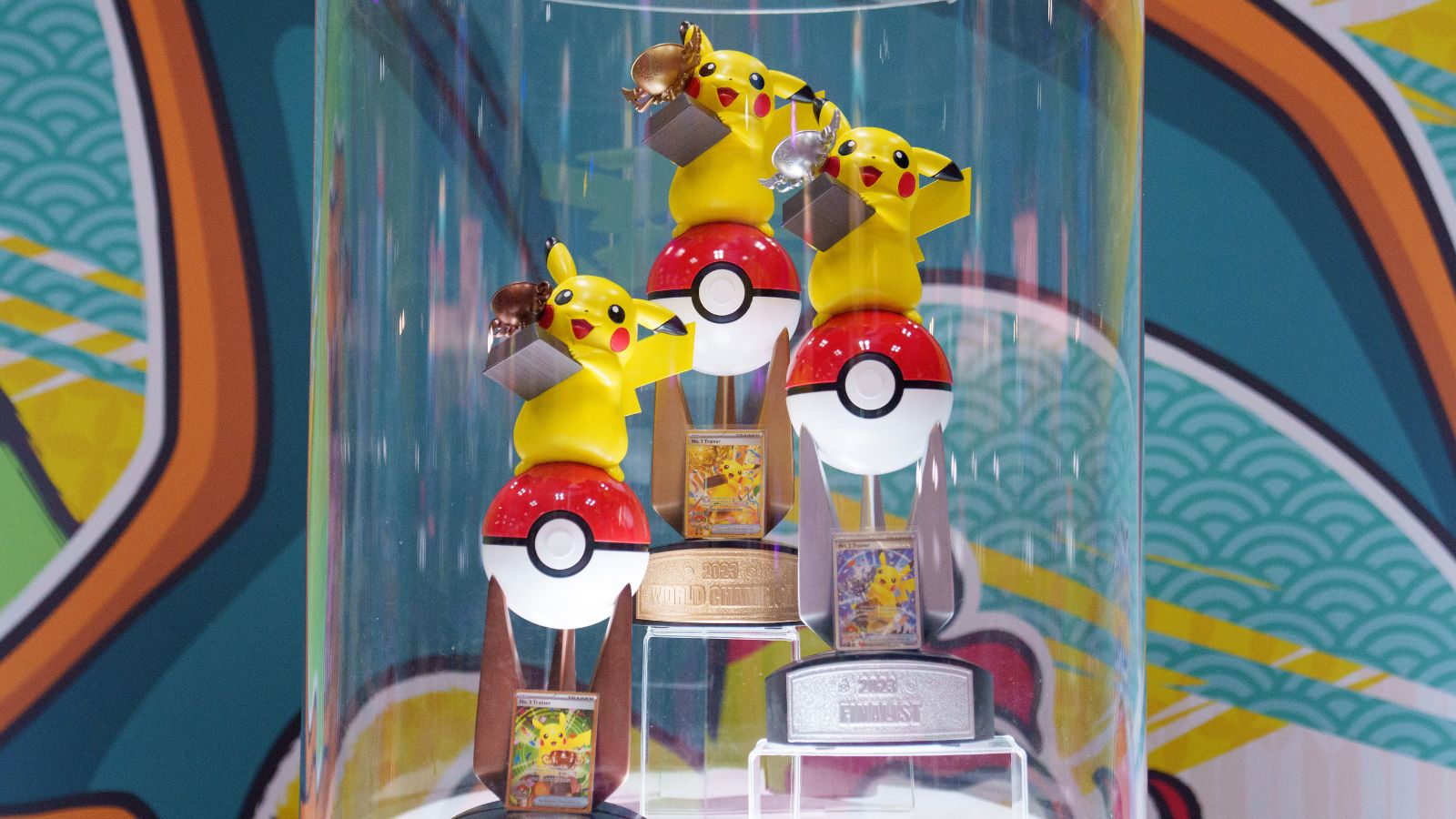 2023 Pokémon trophies in a display case.
