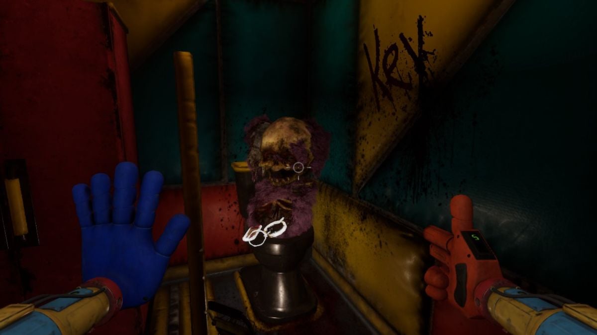 Looking at half of Riley's Bigger Body with the key dangling out of her ribcage and the word "KEY" in blood on the wall next to her