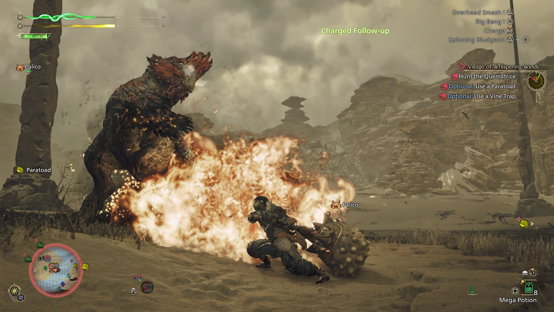 A monster breathes fire at a warrior wielding a large hammer.