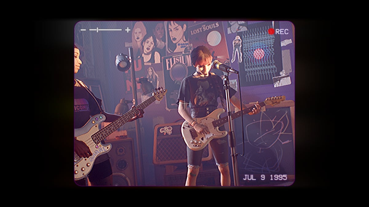 camcorder quality shot of Nora on lead guitar and Autumn on bass