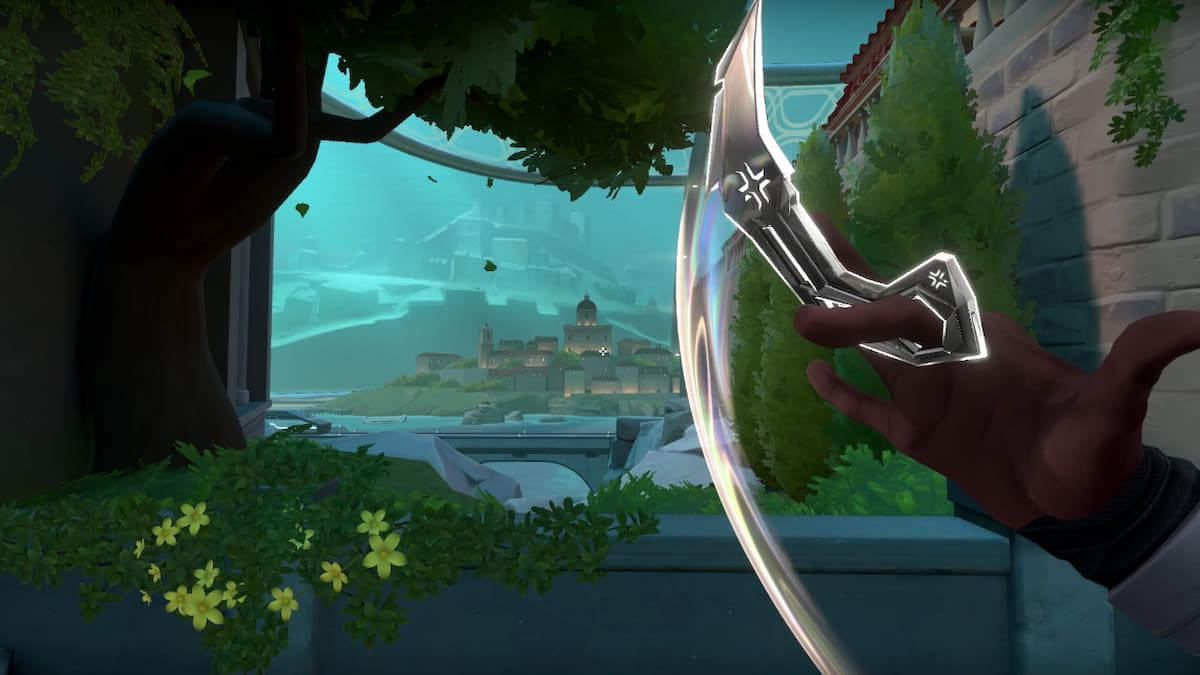 Phoenix swirling the VCT Karambit on Pearl map in VALORANT