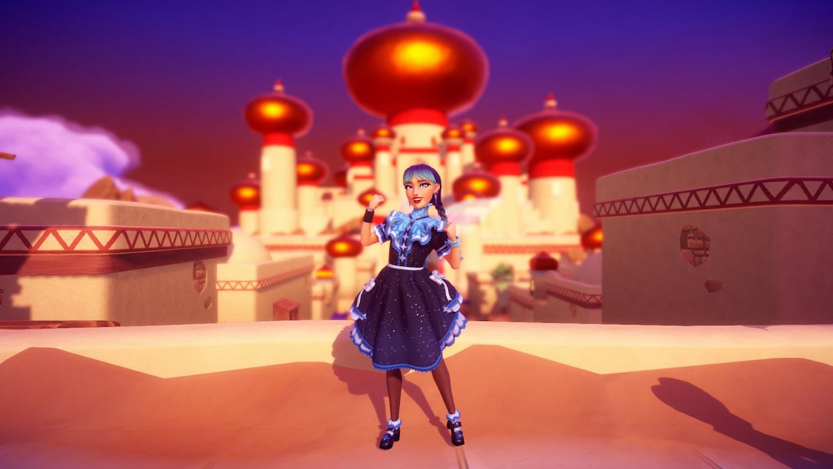 A player in a blue dress standing with their arms up smiling in front of a massive golden palace in disney dreamlight valley