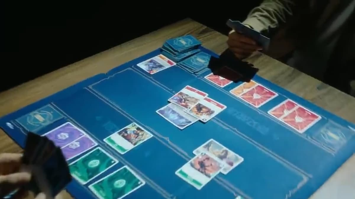 A round of the Project K TCG at a table.
