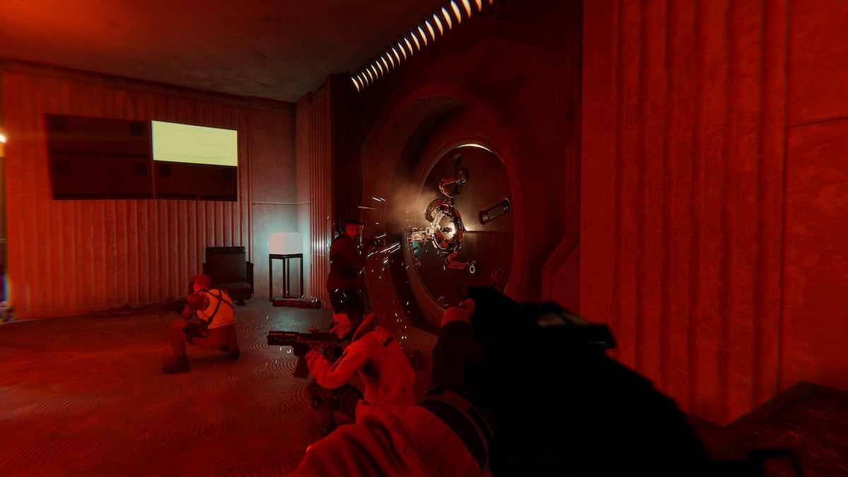 Heisters attempt to crack a safe using a robot drill.