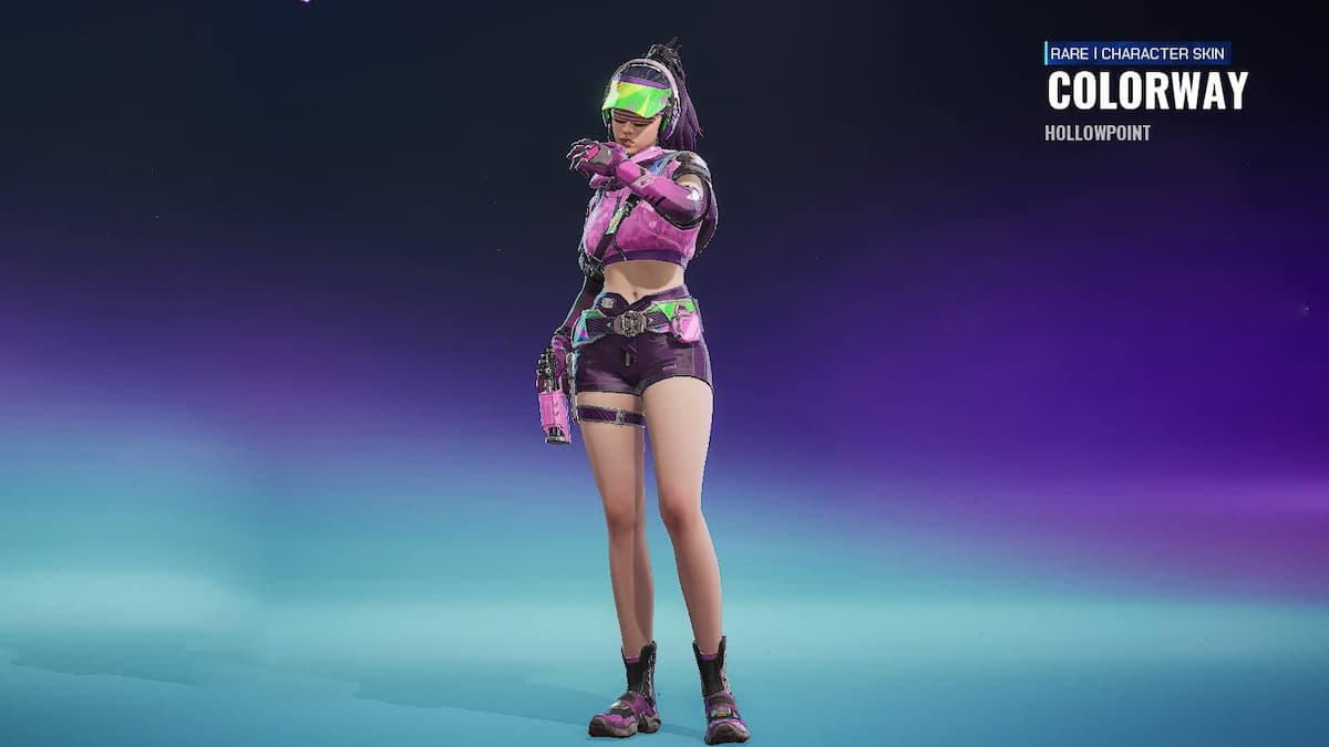 A woman holding her arm to her mouth as if to speak into a hidden microphone. She wears headphones and a pink jacket in FragPunk.