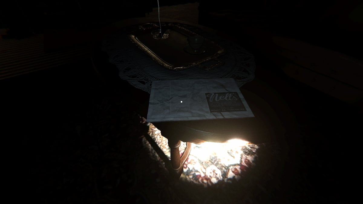 A newspaper with the name Nell's Diner on it in Phasmophobia.