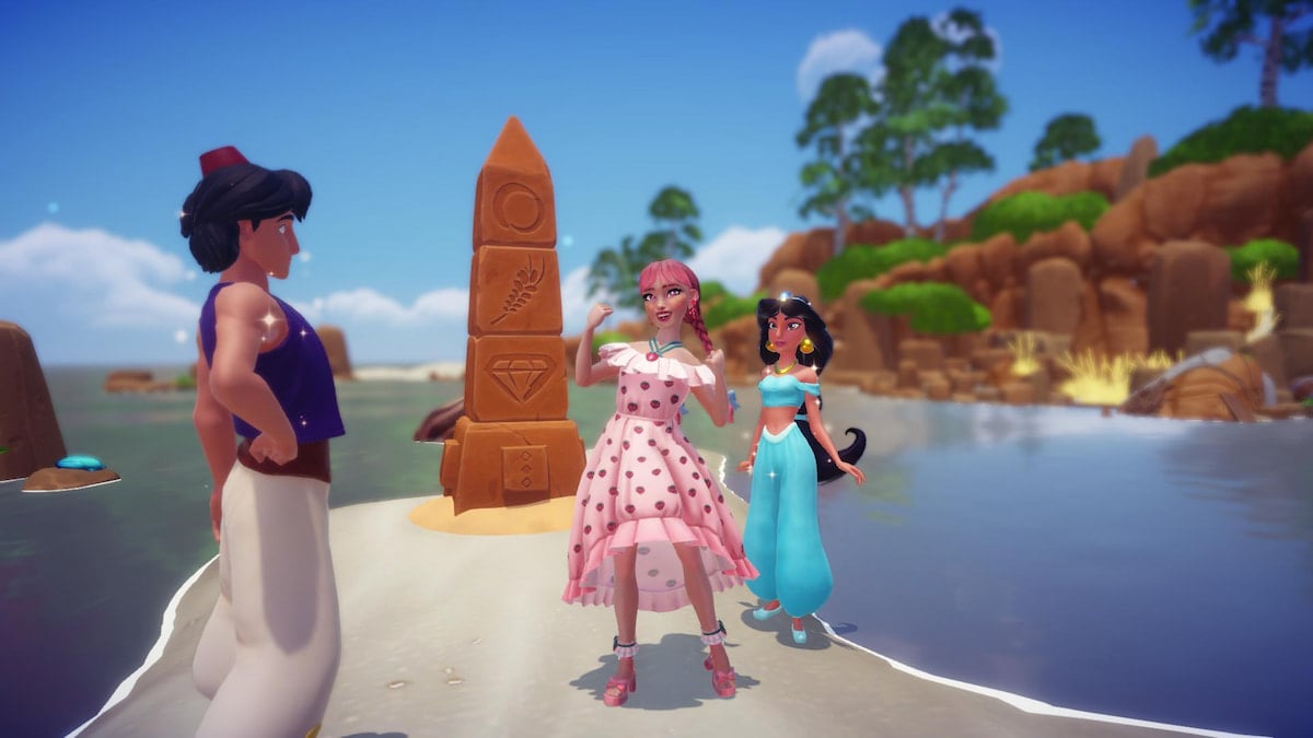 A player in a pink dress with pink braids standing between Aladdin and Jasmine in front of a orange/tan pillar on Ariel's island disney dreamlight valley.
