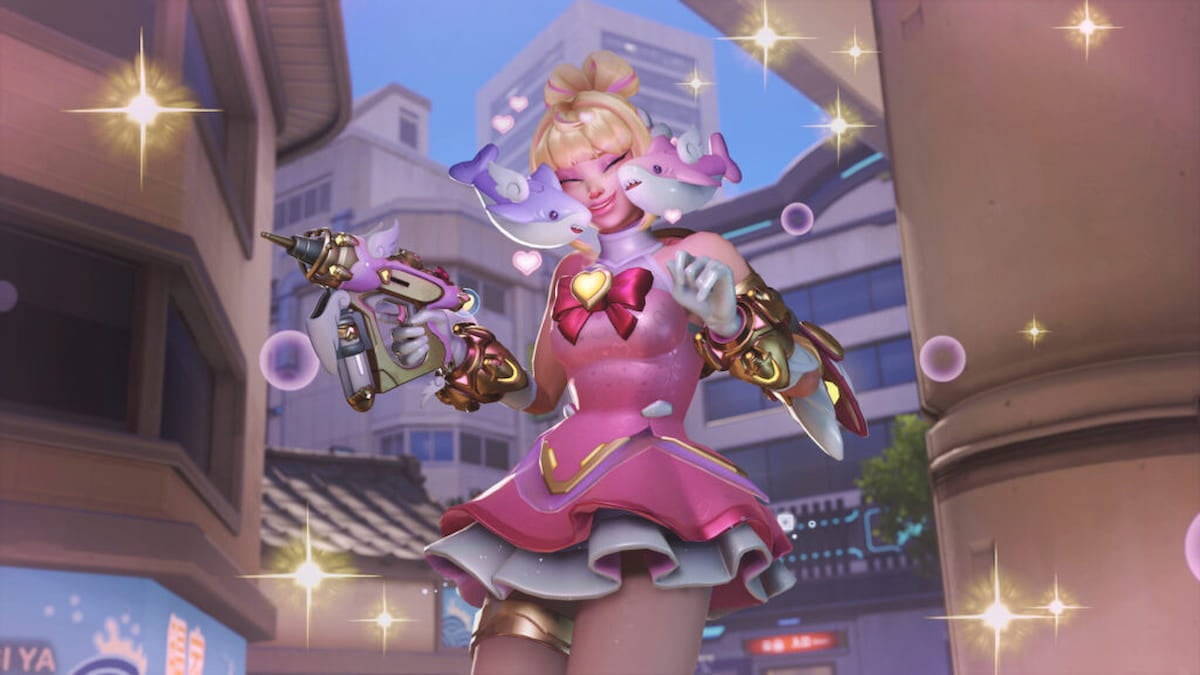 An image from Overwatch 2 of the Mythic Juno skin, which turns her into a member of Dokiwatch. The skin has a pink skirt and two sharks that fire missiles.