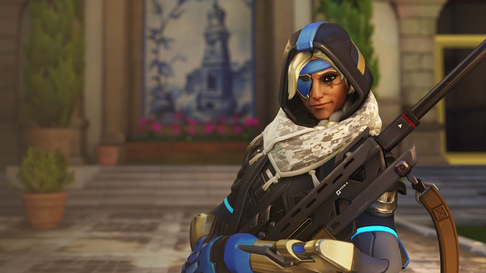 An image of Overwatch's ana holding a sniper rifle