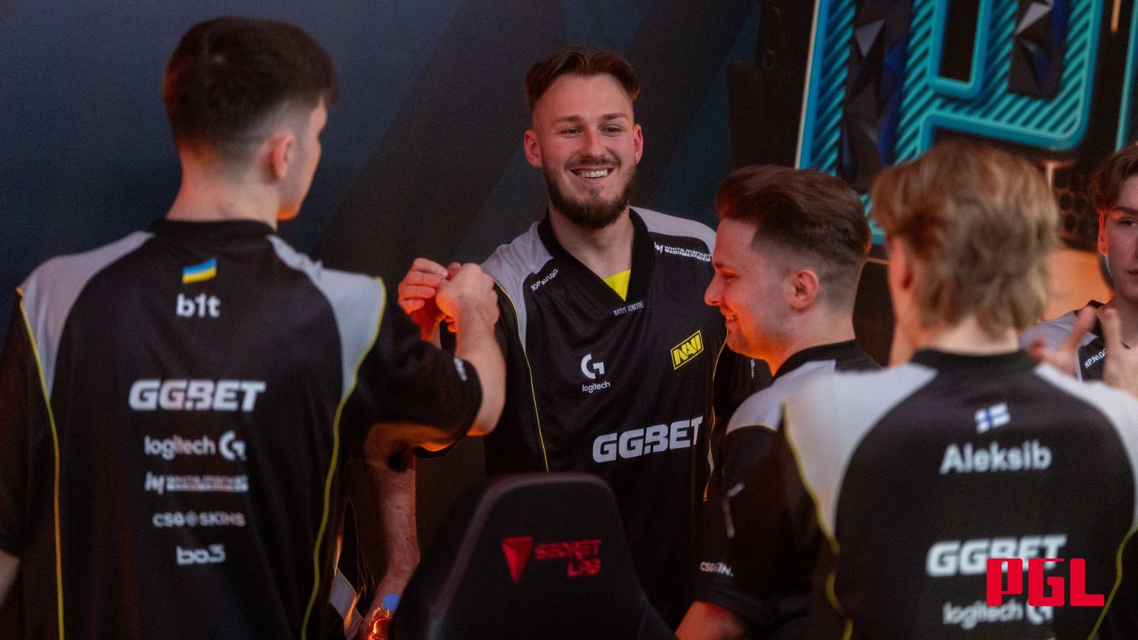 NAVI celebrates after winning a match in PGL Astana 2025.