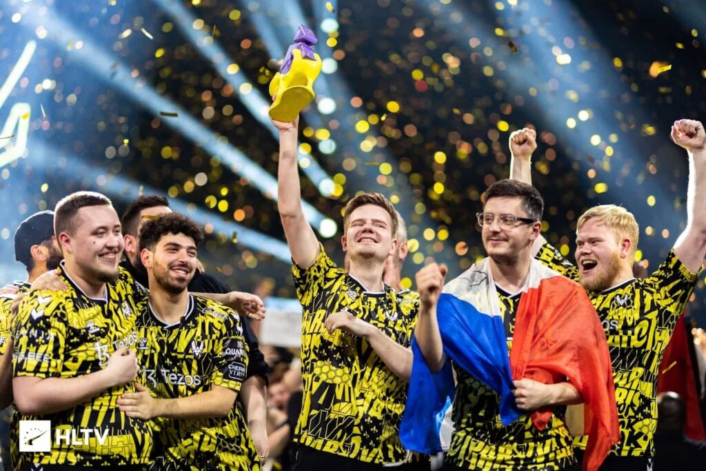 Dupreeh lifts the trophy and his teammates celebrate after Team Vitality's victory at the Paris Major 2023.
