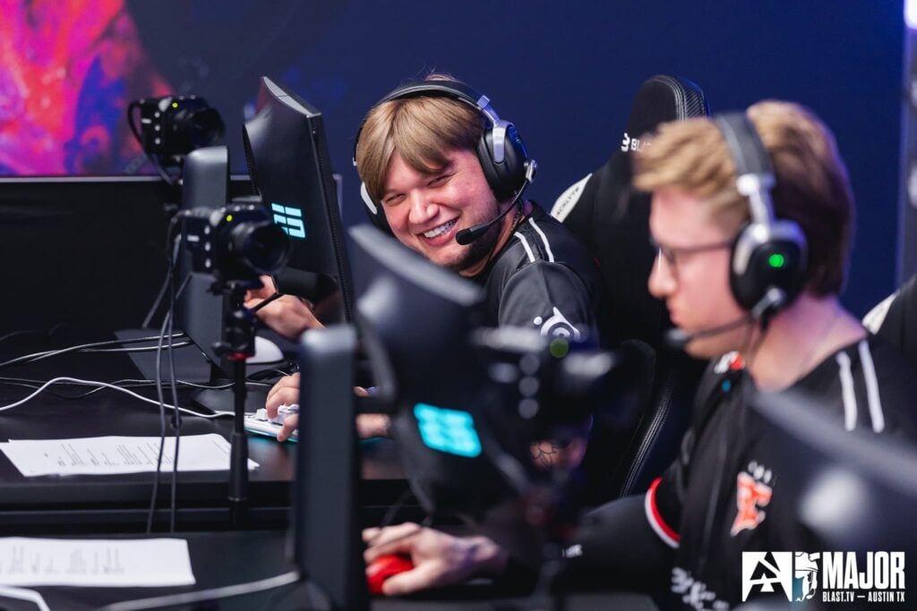 S1mple smiles as he looks at rain during one of FaZe Clan's matches at Austin Major 2025.