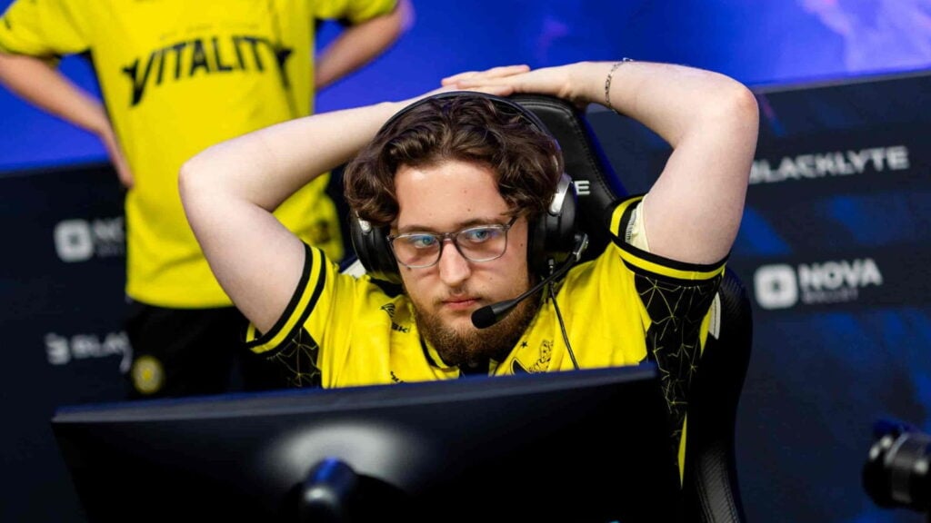 ZywOo sits comfortably in his chair while looking at the monitor screen during a match at the Austin Major 2025.