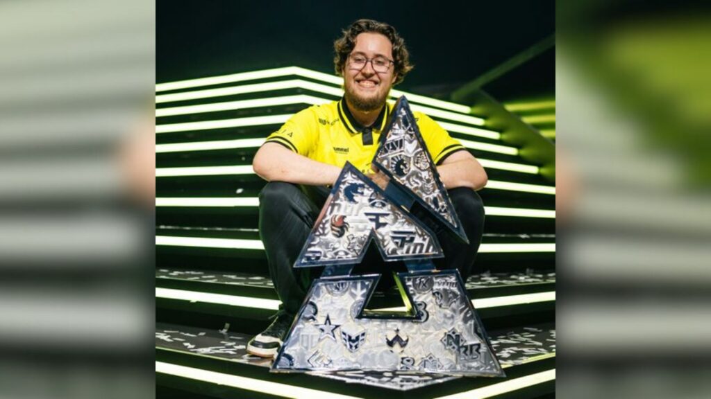 ZywOo is all smiles as he poses with the BLAST Austin Major trophy on the stage.