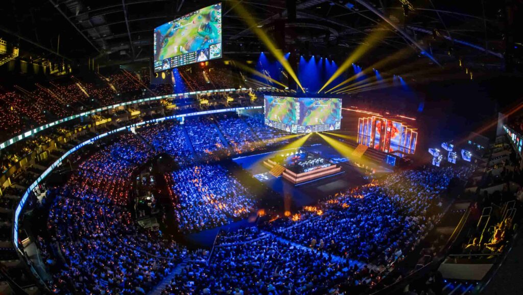 A League of Legends tournament venue filled with crowd.
