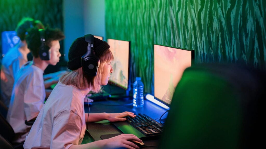 Picture showing a person playing video games esports.