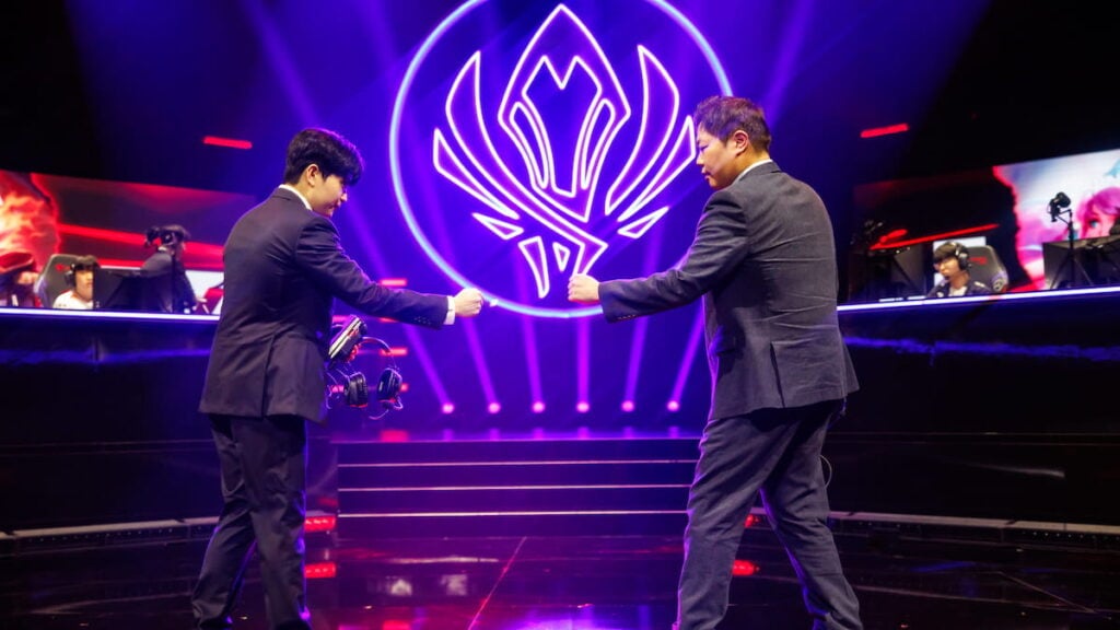 Coach Tom of T1 (L) and coach KIM of Gen.G Esports shake hands during MSI 2025 Bracket Stage Day 8 at the Pacific Coliseum in Vancouver, Canada on July 09, 2025.