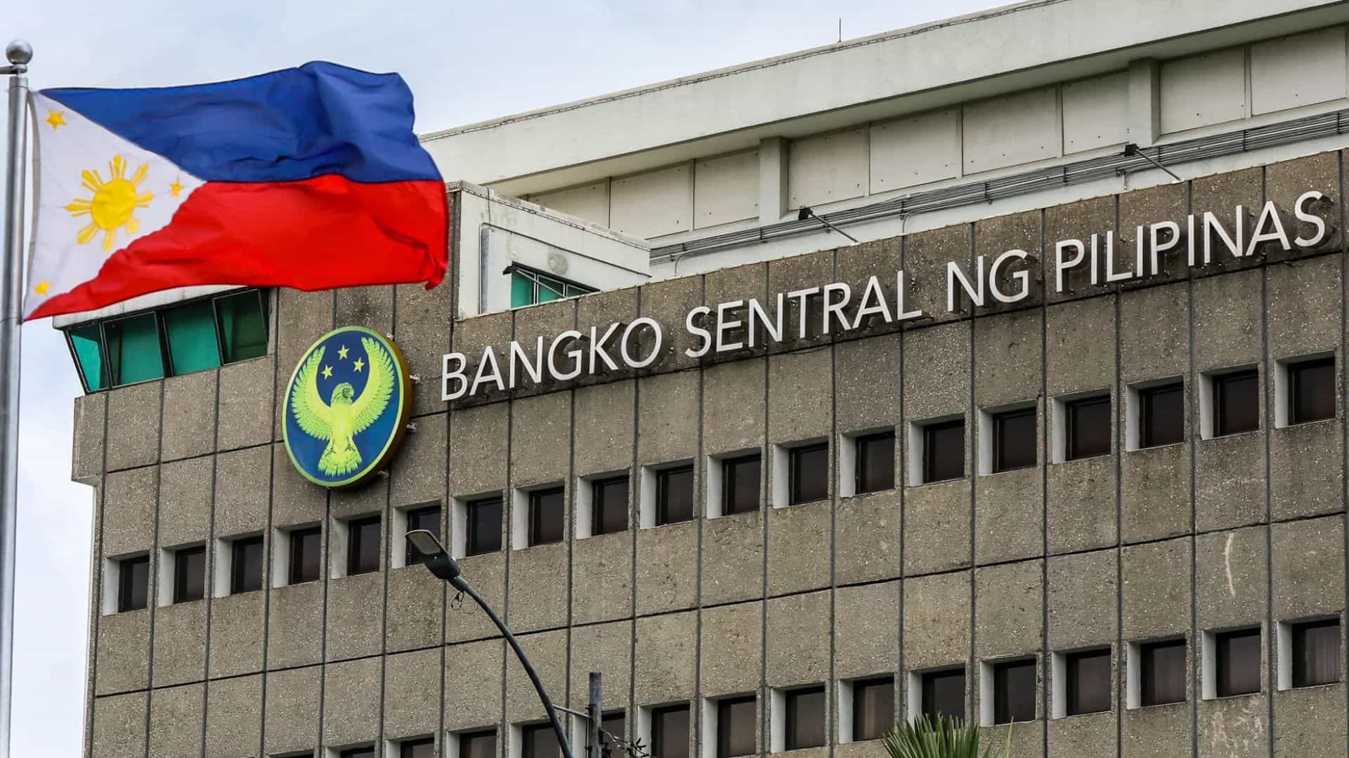 Bangko Sentral ng Pilipinas (BSP) building with the Philippine flag in front.