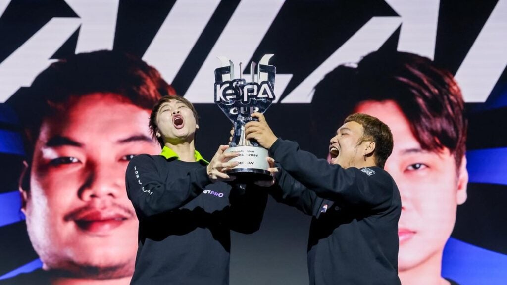 Winners at KeSPA Cup 2024 in FC Mobile celebrate as they lift the trophy.